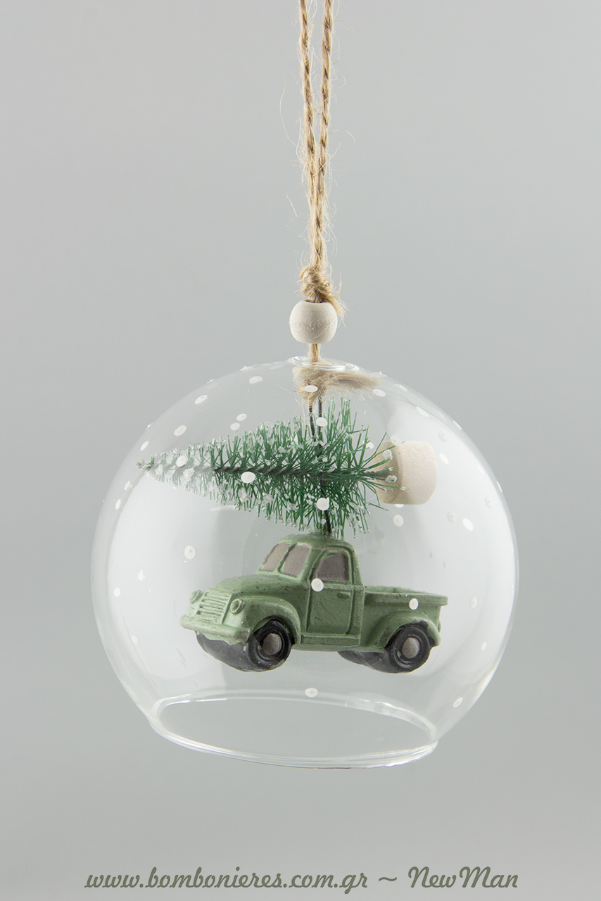 Γυάλινη καμπάνα με αμάξι (κόκκινο ή πράσινο) που μεταφέρει χριστουγεννιάτικο δέντρο.