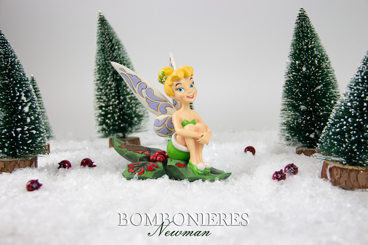 Tinker Bell sitting on holly (13cm).